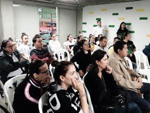 grupo de familia y estudiantes de la Liga de Gimnasia de Antioquia participantes de la reunión