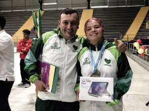 Ana María con su entrenador